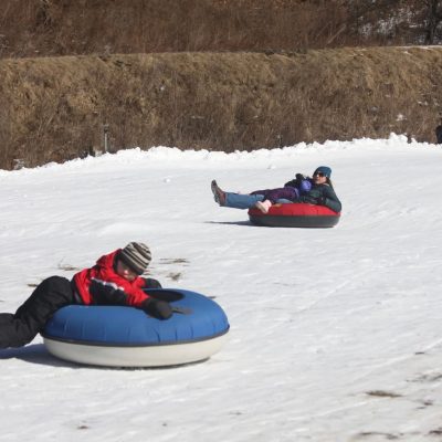 a person lying on the snow