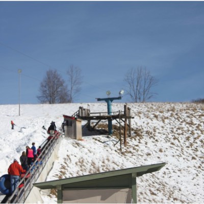 a group of people walking in the snow